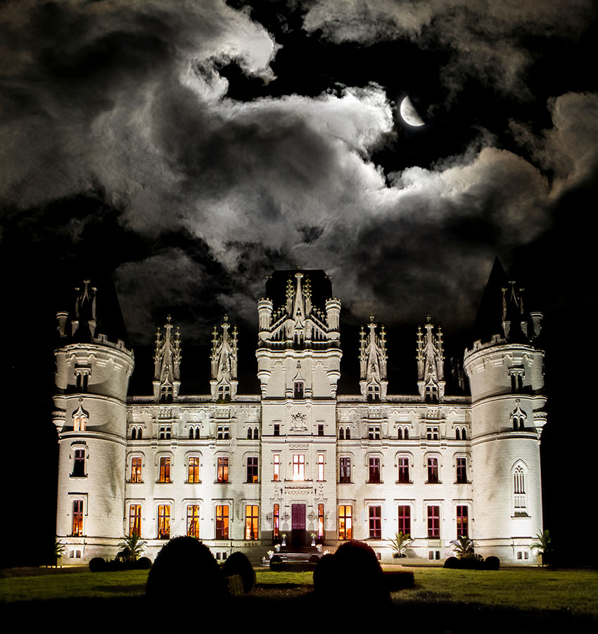 Chateau de Challain's front side at night