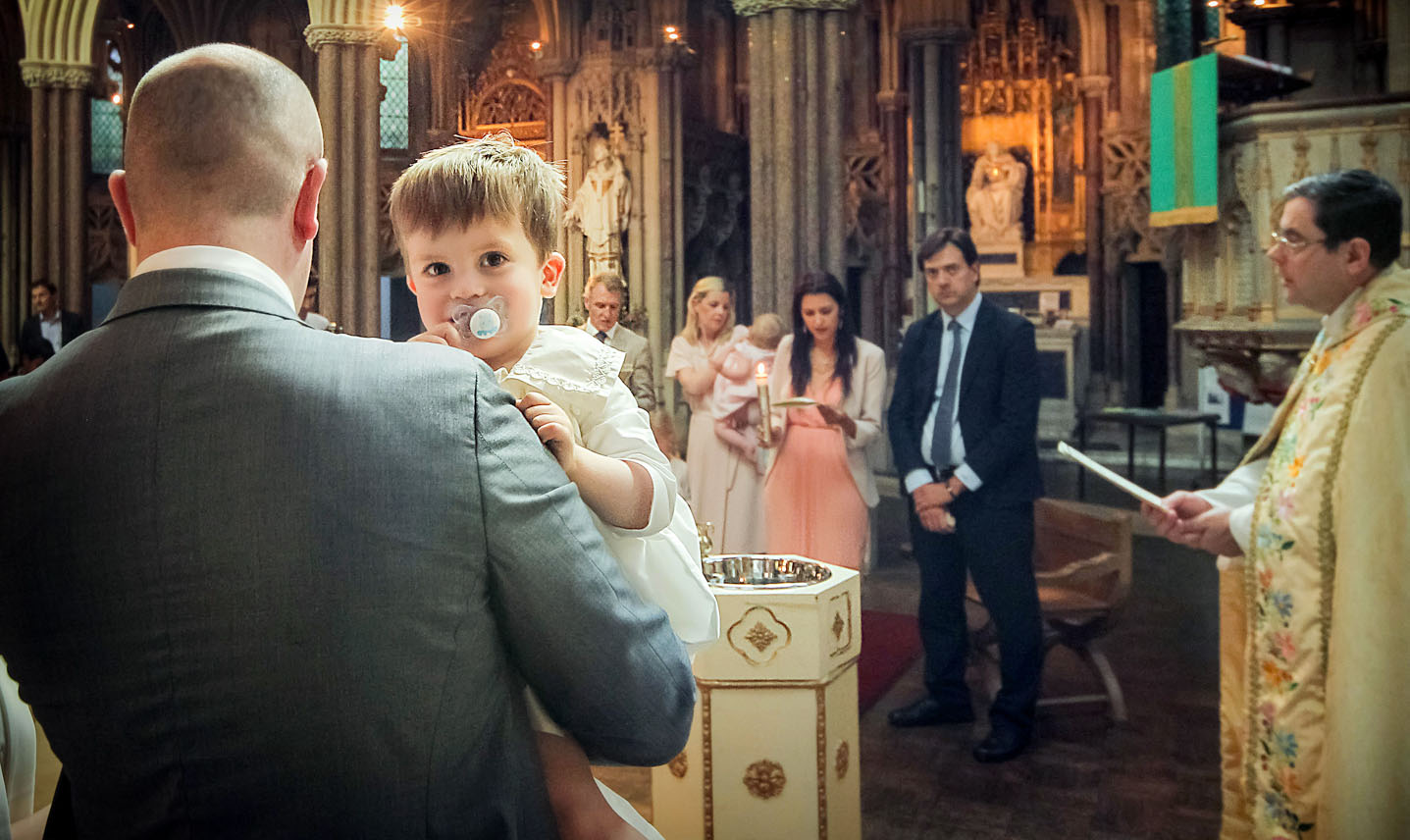 Christening photographer captures the catechism blessings during the baptism